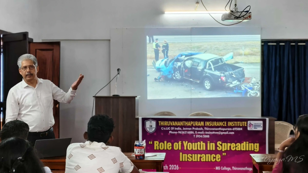 Speaker addressing students during the insurance awareness seminar at M.G. College